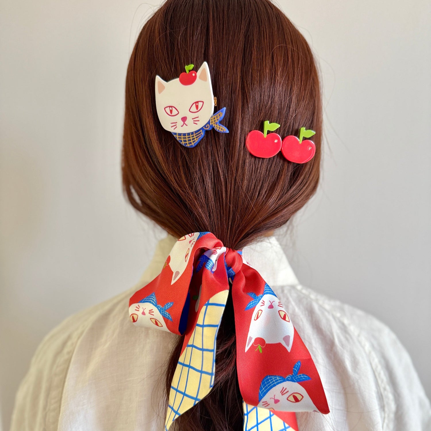 Apples  Kitty Cat Alligator Hair Clip is part Centinelle's apple kitty capsule collection.